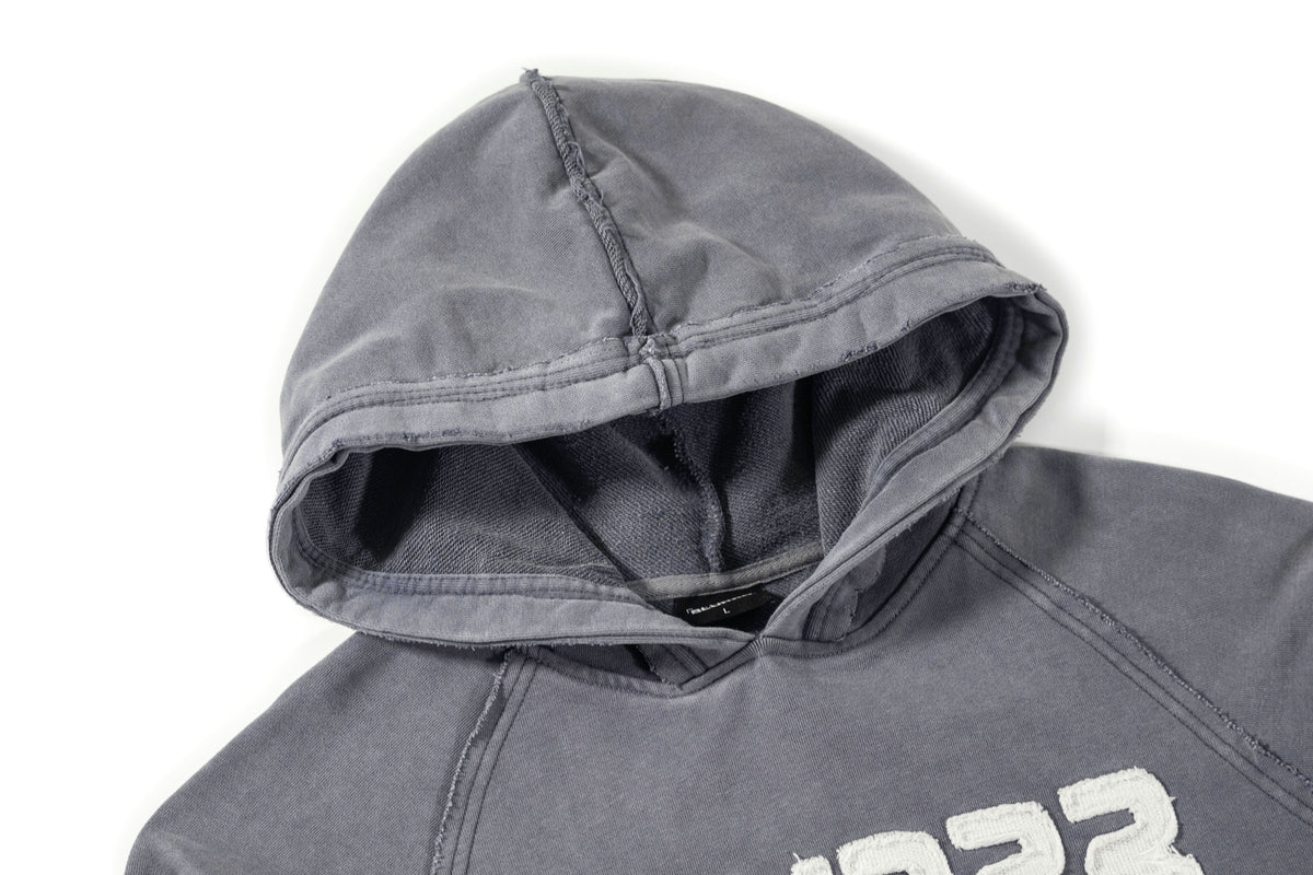 Grey hoodie with a brand logo on a white background