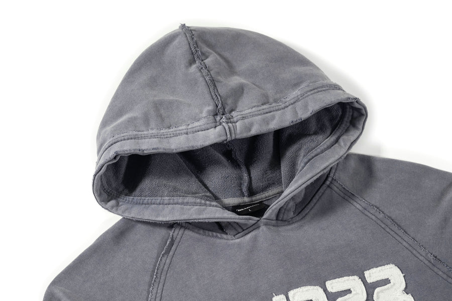 Grey hoodie with a brand logo on a white background