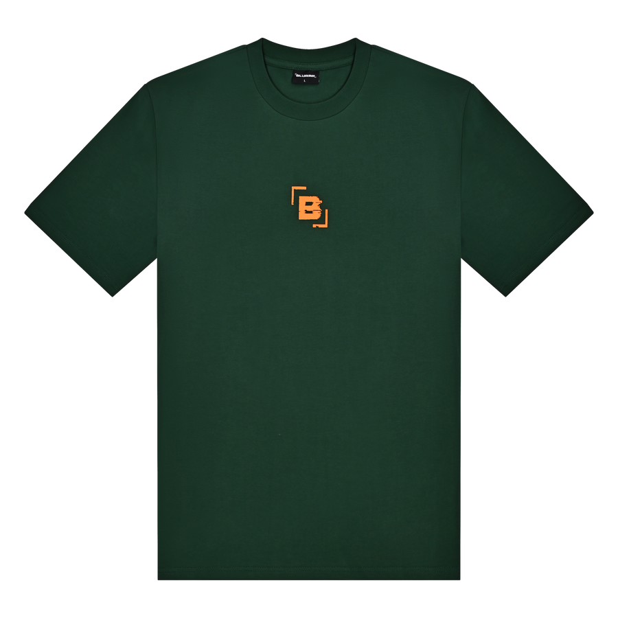 Green t-shirt with a small orange logo on a white background