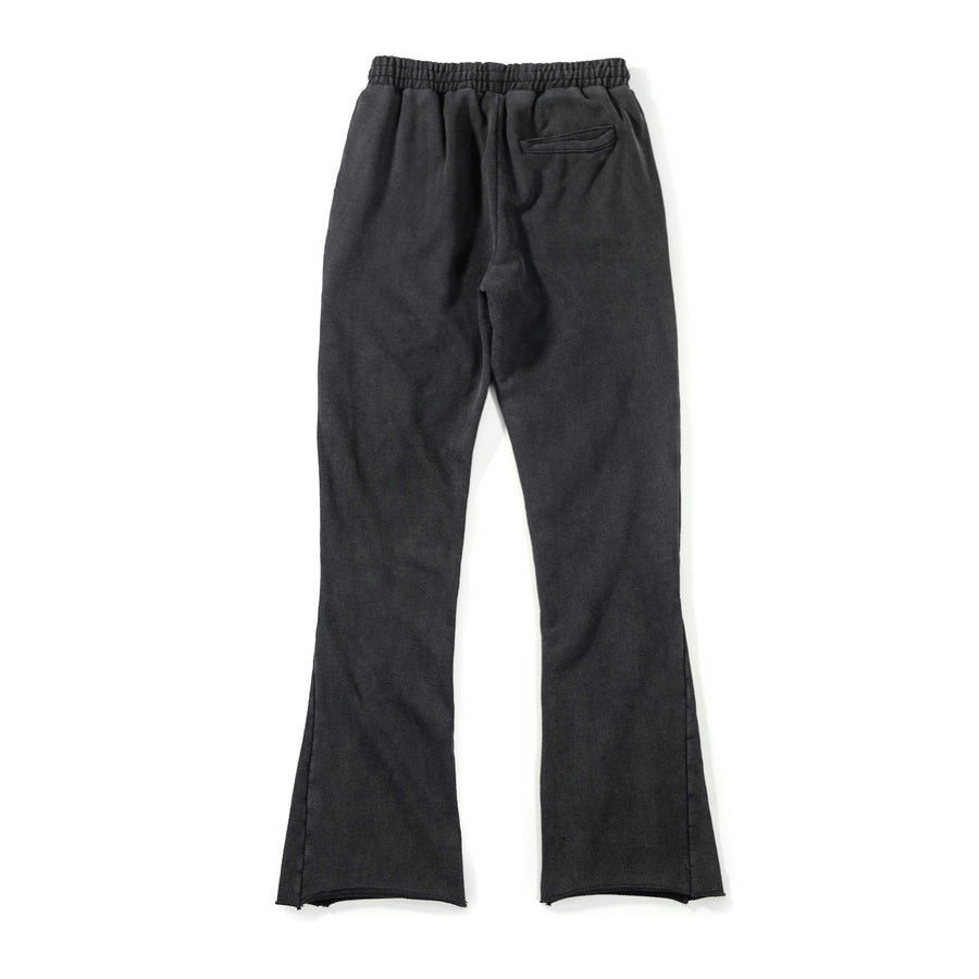 Acid wash black sweatpants on a white background