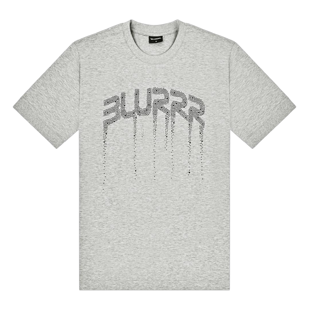 A light grey crewneck t-shirt featuring a stylised 'BLURRR' graphic across the chest made of small black dots, with a dripping effect, shown on a plain white background.