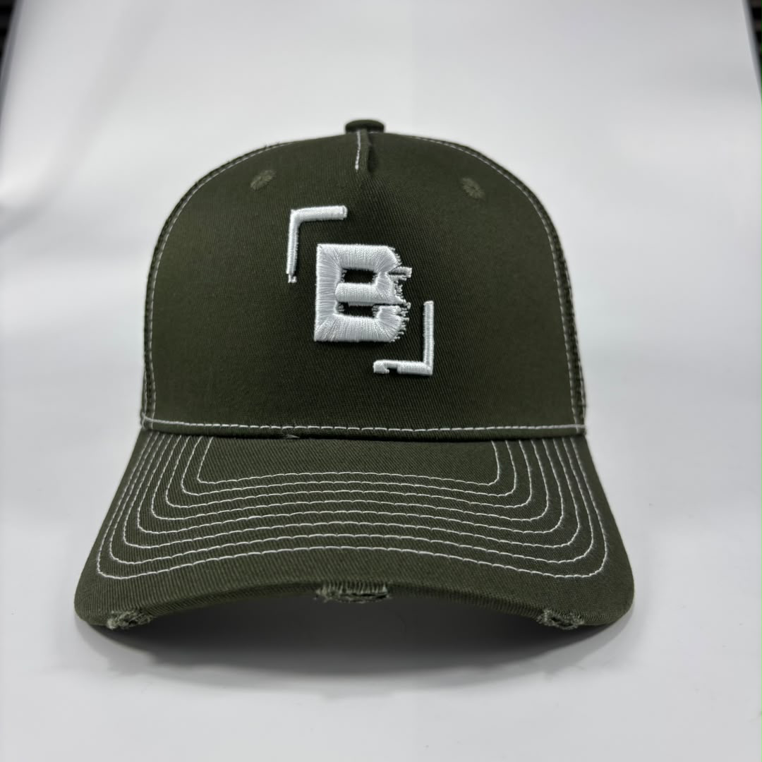 An olive green distressed baseball cap with white contrast stitching and a white embroidered 'B' logo on the front, displayed against a light grey background.